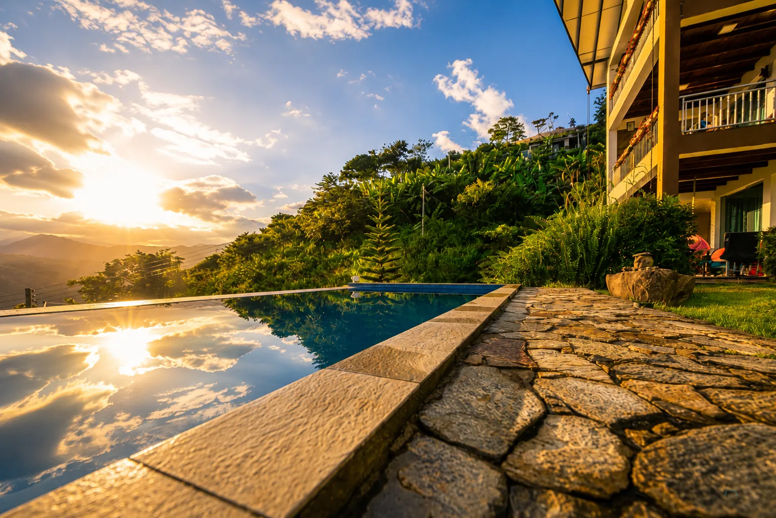 Sunset pool mountain view